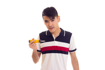 Young man holding a screwdriver