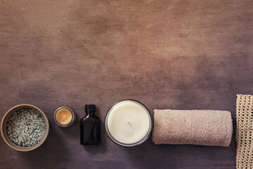 Organic spa cosmetic and products from above on stone background. Toned. Copyspace