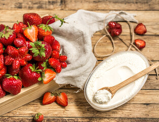 arrangement with fresh strawberries on wooden background