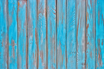 Fototapeta na wymiar Blue wood planks, a shabby wooden surface of the kitchen table