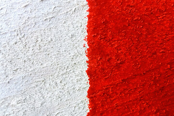 Background or texture of red-white painted wooden board close-up