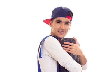 Young man in overall holding toolbox