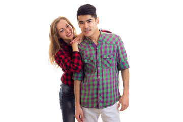 Naklejka premium Young couple in plaid shirts