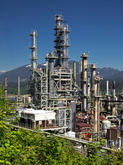 Oil refinery on a background of nature, Burrard Inlet and mountain view