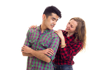 Young couple in plaid shirts