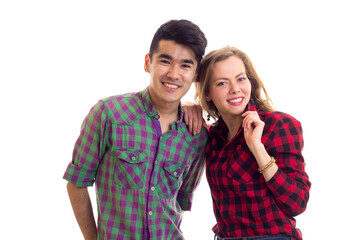 Young couple in plaid shirts