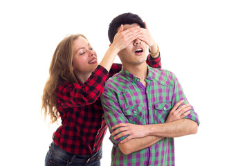 Naklejka premium Young couple in plaid shirts