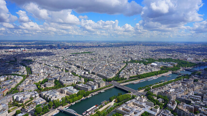 Aerial view of river Seine from Eiffel tower with beautiful scattered clouds, Paris, France