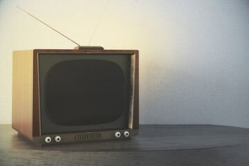Old TV on concrete background