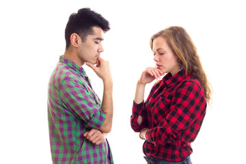 Young couple in plaid shirts