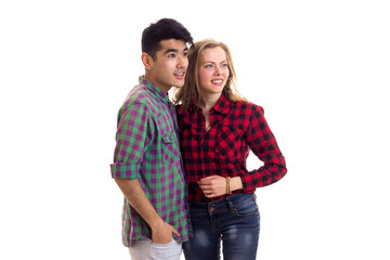 Fototapeta premium Young couple in plaid shirts