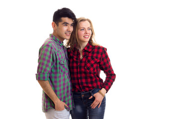 Young couple in plaid shirts