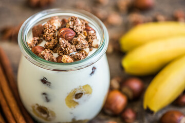 Serving of Yogurt with  Muesli, Banana and Nuts