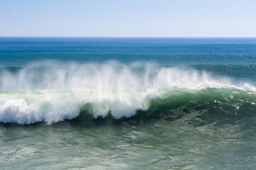 Powerful wave at beach