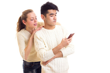 Young couple using smartphone