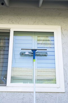 Washing Window On A Home