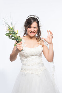 Bride Gone Mad, Unhappy And Stressed Bride Holding Bouquet