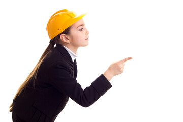 Little girl in yellow protective helmet