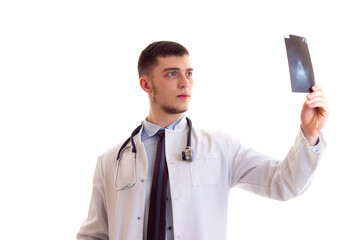 Young man in doctor gown