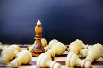Concept of leadership, success, motivation. Chess pieces on the Board.