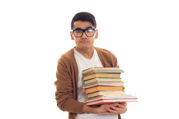 Young man in glasses with books
