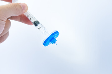 Water filtration, a person filtering water through membrane filter
