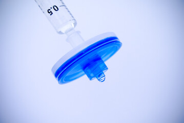 Water filtration, syringe filter isolated on white background