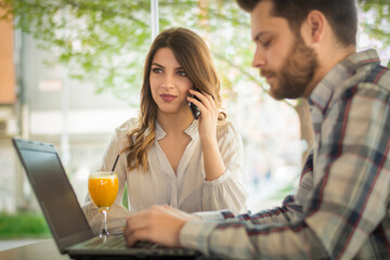 Businesspeople In A Cafe