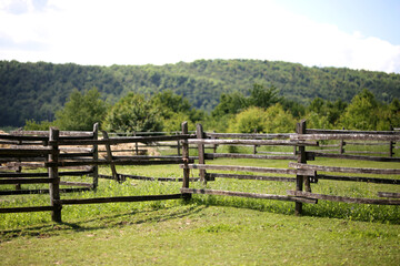 Closeup of wooden fence on a corral farmland rural scene