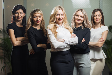 Portrait Of Young Businessman With Business Team