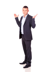 Businessman making undecided gesture