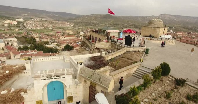 Aerial view, general view of Urgup and Turkish flags, Cappadocia, TURKEY 