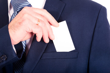 Businessman taking a blank card from pocket