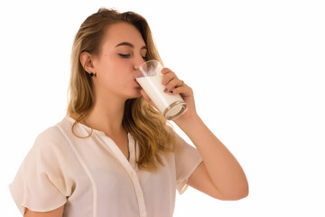 Young pretty girl, glass of milk, white background  