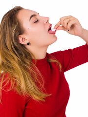 Young pretty woman, pill, white background  