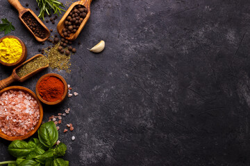 Obraz na płótnie Canvas Herbs and spices over black