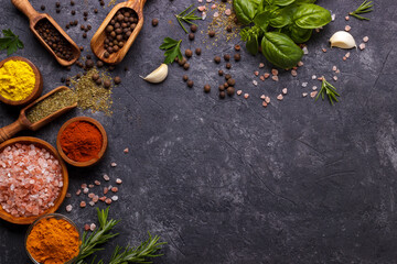 Herbs and spices over black