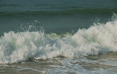 Beautiful waves of South China Sea on Dadonghai beach.