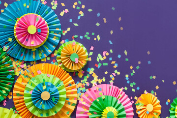 Colorful bright paper rosette. Decorating for a party.