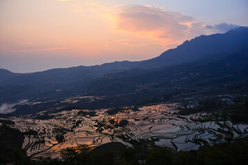 Fototapeta premium Yuanyang rice terraces UNESCO Cultural World Heritage Site in Yunnan, China