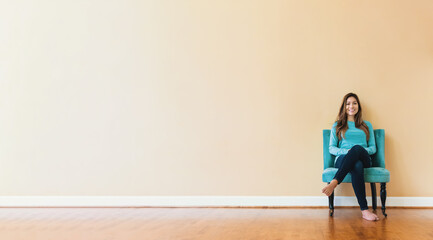 Young latina woman sitting in a chair