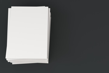 Stack of blank white closed brochure mock-up on black background