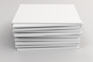Stack of blank white closed brochure mock-up on white background