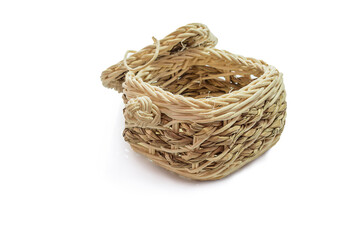 Small wooden basket on white background.