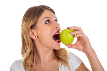 Young girl on diet holding a green apple