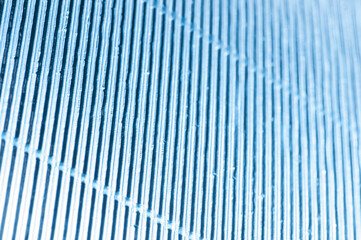 Abstract metallic blue background with stripes