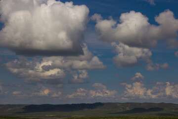 Steppe in spring, Kazakhstan. Amazing clouds and sky