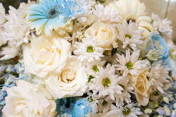 Obraz na płótnie Canvas Bridal bouquet white and blue flower for decoration wedding party
