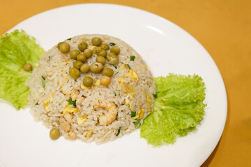 Yong Chow seafood fried rice delicious with shrimp, prawn, egg stir, and a light garnishing of spring onions with peas topping