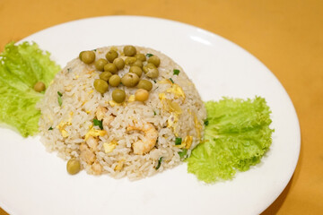 Yong Chow seafood fried rice delicious with shrimp, prawn, egg stir, and a light garnishing of spring onions with peas topping